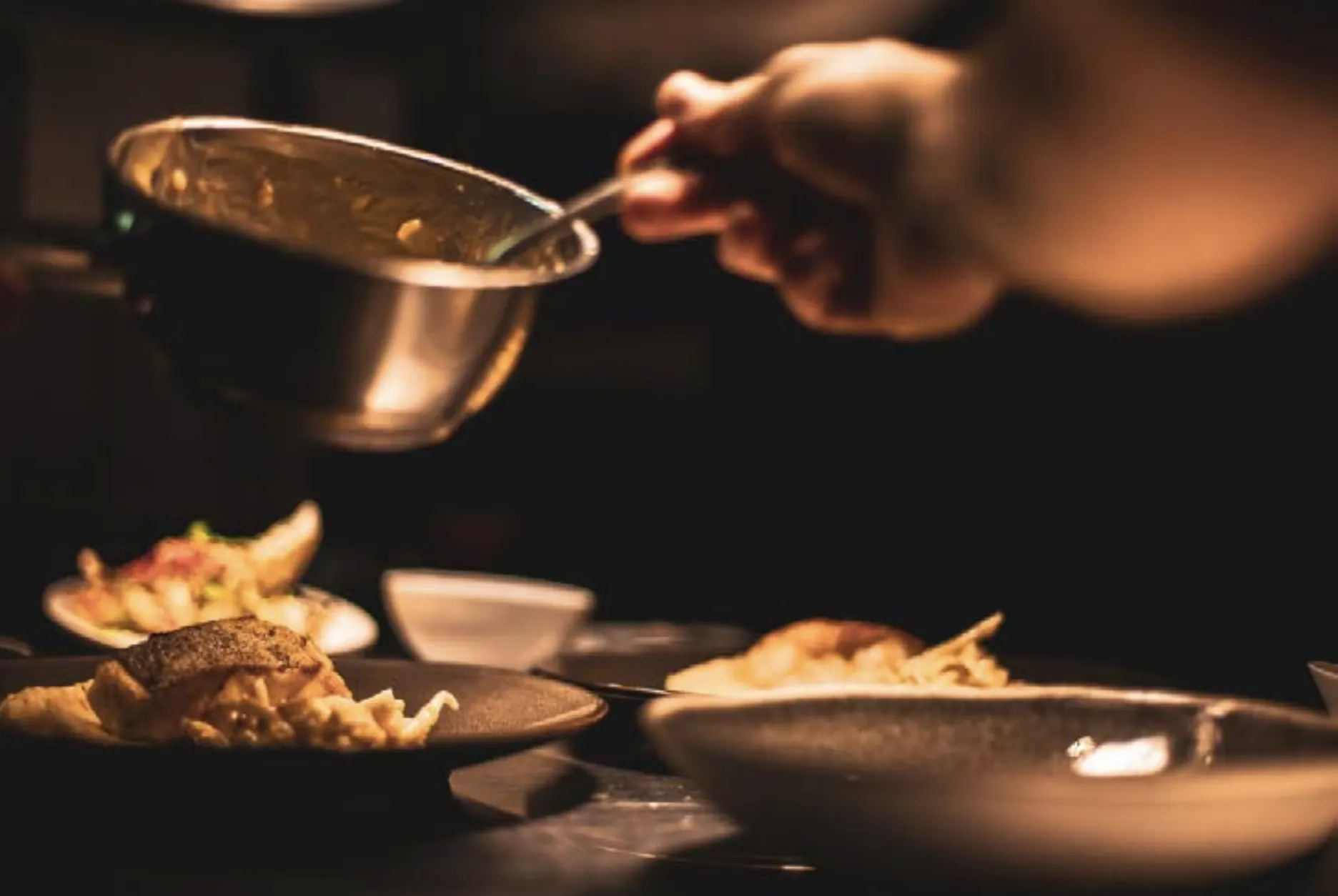 Chef plating a dish